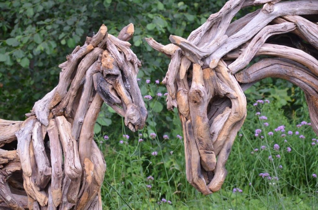 Garden Figures With Their Hands